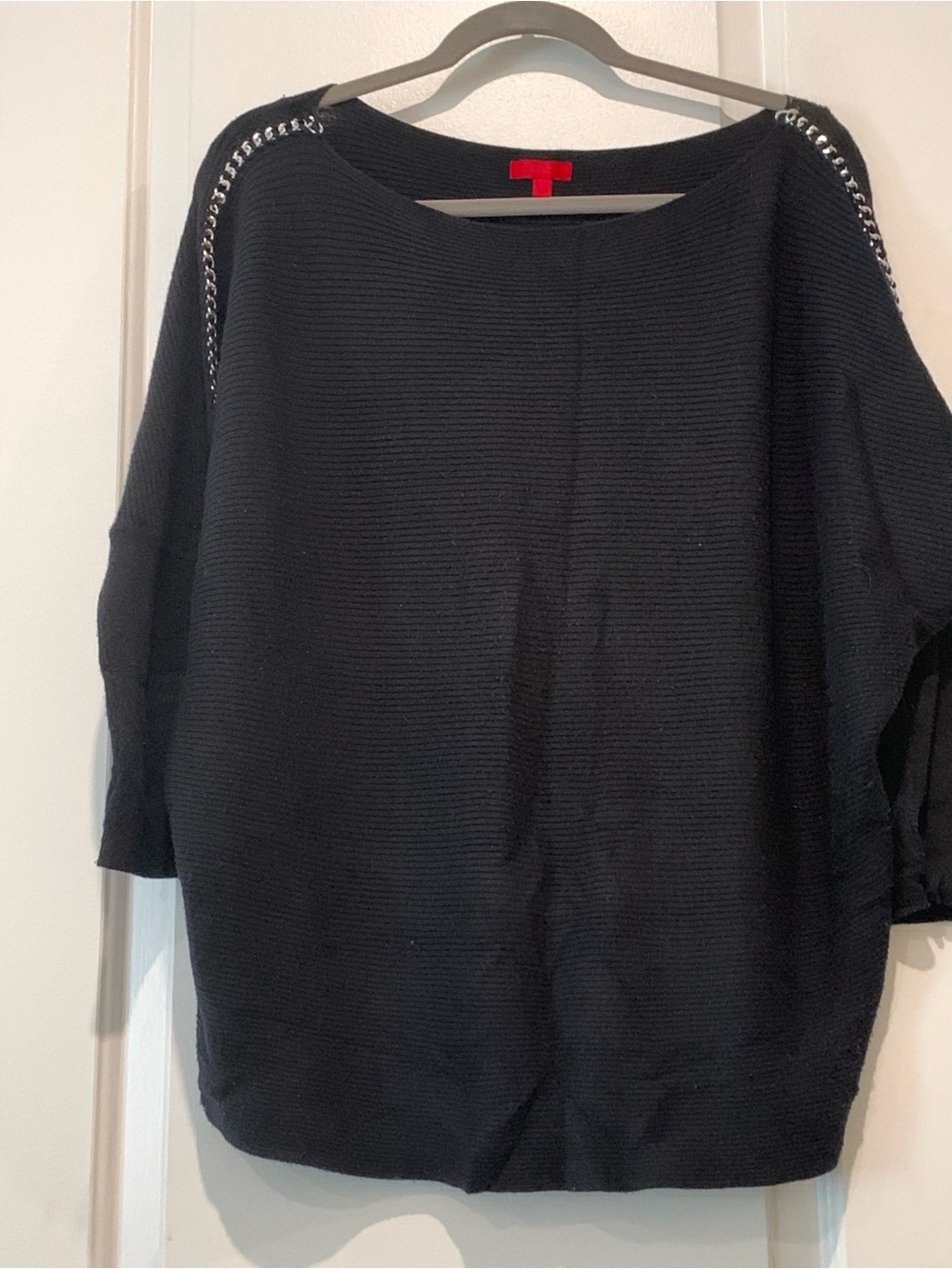 Jennifer Lopez Black Off-the-Shoulder Sweater with Chain Accent